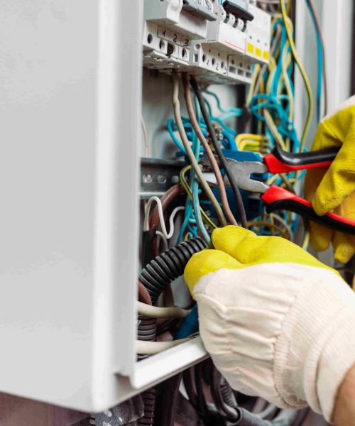 cropped-view-of-workman-in-gloves-holding-pliers-w-2026-01-06-00-24-39-utc_11zon